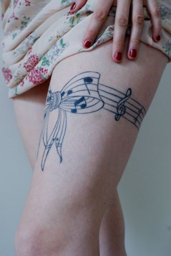 Music Tattoo Will Get One That Contains Musical Bars And Notes Just