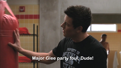 Finn in a training room saying "Major glee party foul, dude!"
