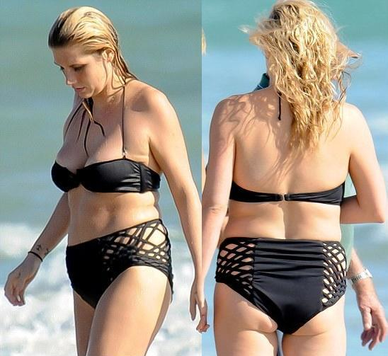 kesha bikini photos. Ke$ha proud of her muffin top