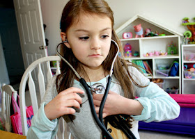 Tessa listened to her heart and then mine. She got a kick out of how much faster hers beats. (I bought an inexpensive Omron Sprague Rappaport Stethoscope from Amazon for this activity. It worked perfectly for us.)