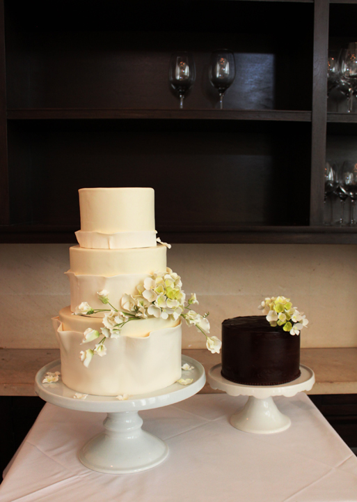 Our bride Hillary ordered a white stacked cake with flowing sugar ribbons