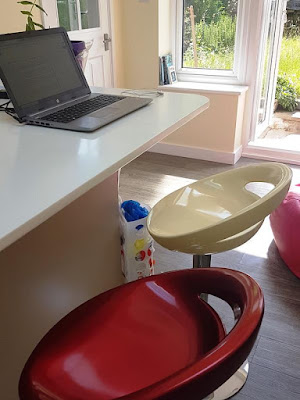 Red and yellow bar stools in my kitchen