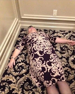 OLD WOMAN LYING ON CARPET CAMOUFLAGE