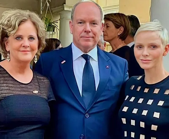 Princess Charlene wore a new square intarsia pattern knit dress by Akris. Dior leather pumps. Ambassador Menna Rawlings