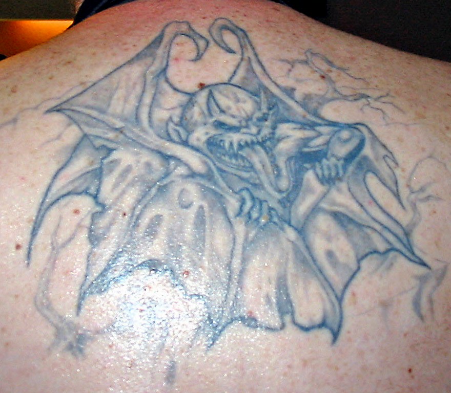 The Tattoos of Paul N. Dion . Mike also sent a photo of this gargoyle on his 