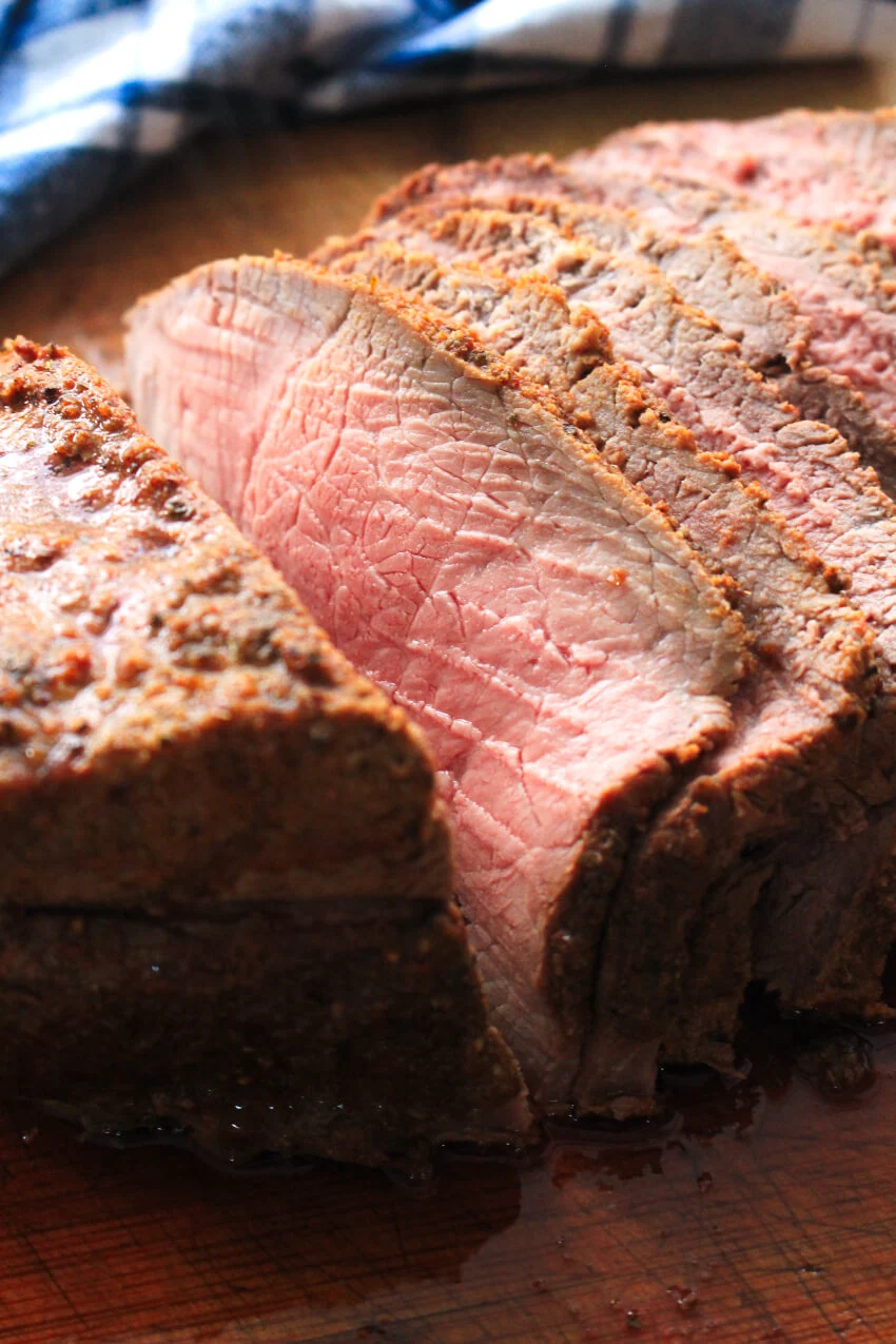 This herb-rubbed Sirloin Tip Roast is a frugal cut of beef that yields deliciously tender, flavorful, juicy meat. You won't believe how easy it is to make! #sirloin #dinner #beefrecipe