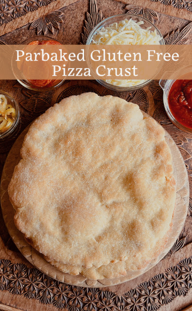 Food Lust People Love: Long proofing and the addition of baking powder ensure that this parbaked gluten free pizza crust is chewy, crunchy and able to support all the toppings you love.
