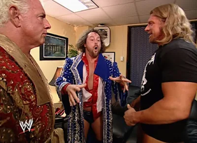 WWE Vengeance 2004 Review - Eugene tries on a Ric Flair robe in front of Ric Flair and Triple H