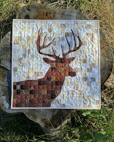 Reverse applique deer quilt