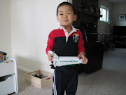 The boys each received a Hess truck, Donovan's with a jet airplane, . (img )