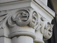 Snake grotesques carved into a capital; Parliament Building, Victoria BC.