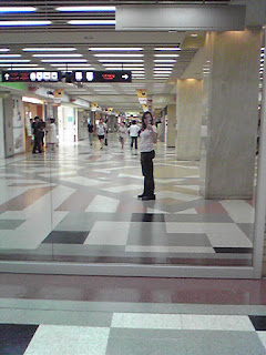 This hallway in the basement of JR Kyoto Station stops at a dead end with a mirrored wall