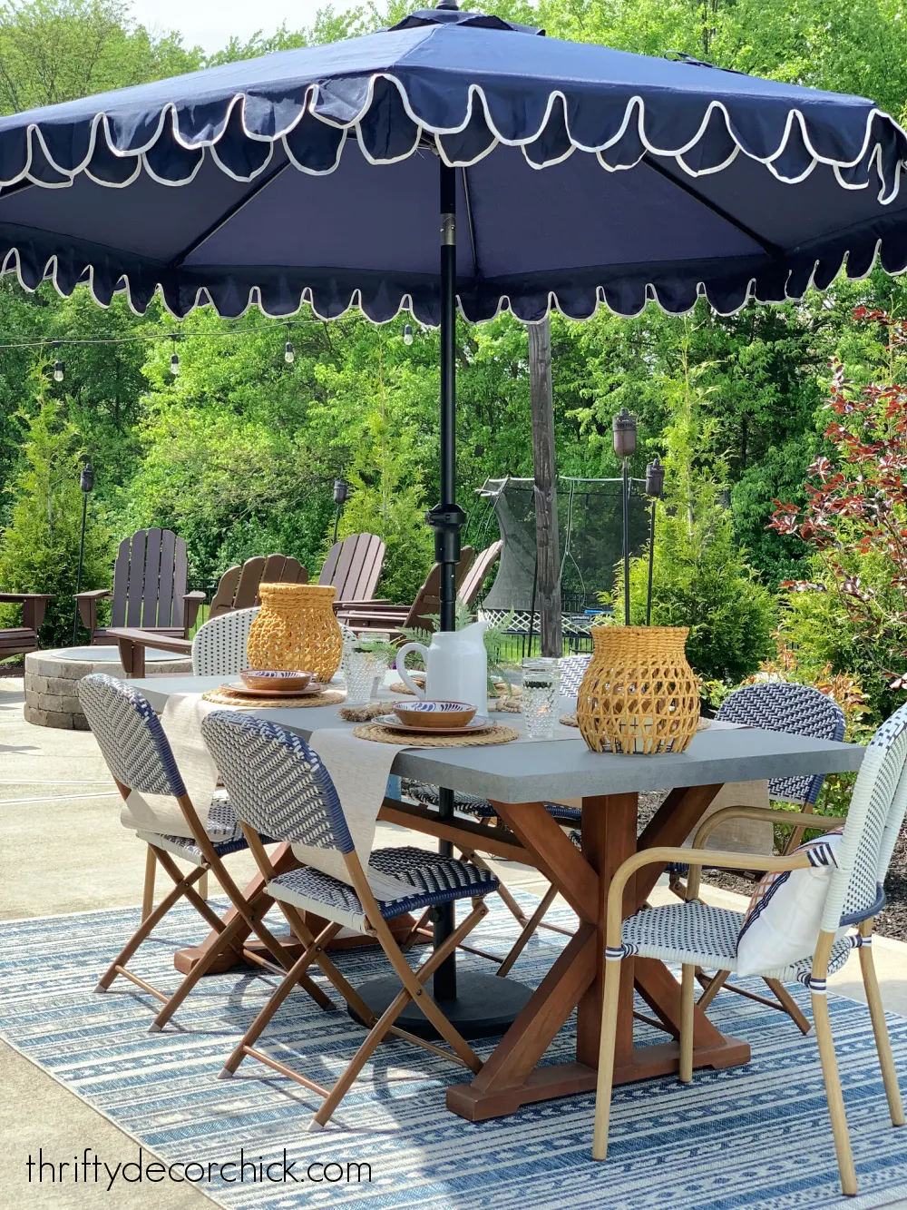 outdoor table with scalloped umbrella