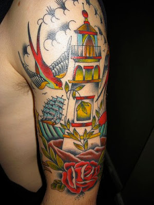 half tattoo sleeve consists of swallow tattoo, tree tattoos and hibicus
