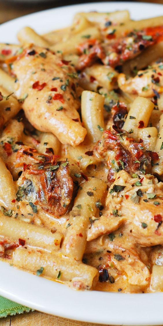 Chicken Mozzarella Pasta with Sun-Dried Tomatoes. 