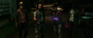 The Wrecking crew, four grungy looking men each carrying a glowing piece of construction equipment. One has a glowing helmet, one a glowing crowbar, one glowing gloves and the last guy has a wrecking ball on a chain.