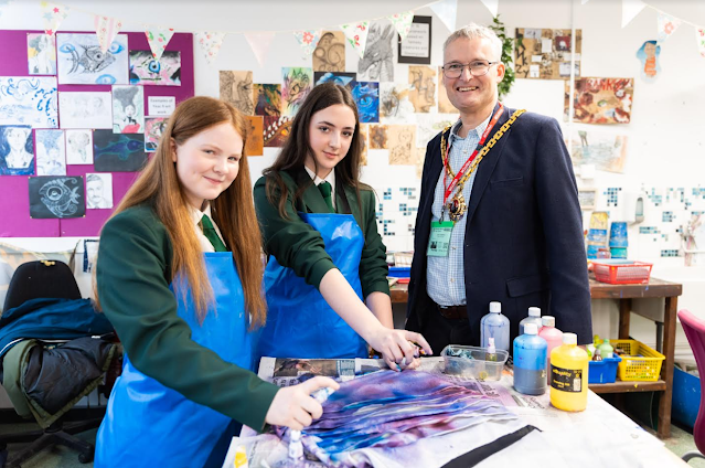 the Mayor with year 9 pupils Rhiannon Lewis and Melody Preston, who are preparing clothes to be modelled and auctioned in aid of Age UK at the charity fashion show at The Guildhall on Thursday 14 March 2024.