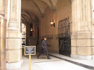 Photo of the entryway to the Dakota Apartments. Side view, showing the steps to the lobby that John Lennon walked up before he collapsed, 8 Dec. 1980.