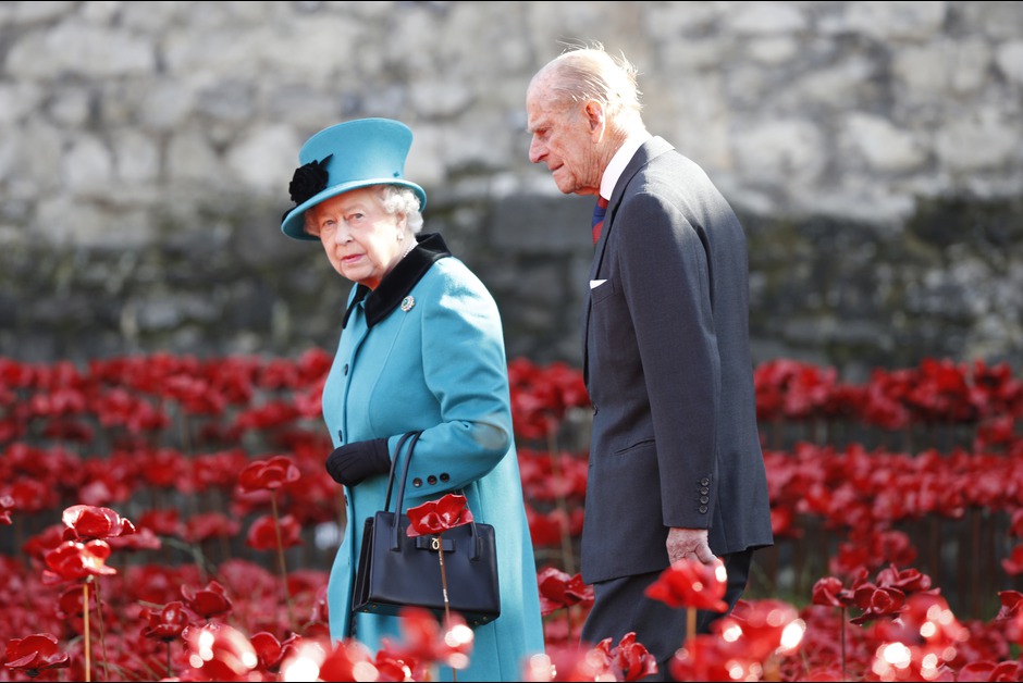 Queen Elizabeth II and Prince Philip, Duke of Edinburgh visit the Blood Swept Lands and Seas of Red evolving art installation at the Tower of London