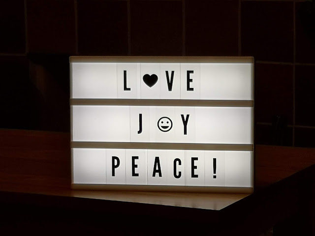 Light box saying love, joy and peace