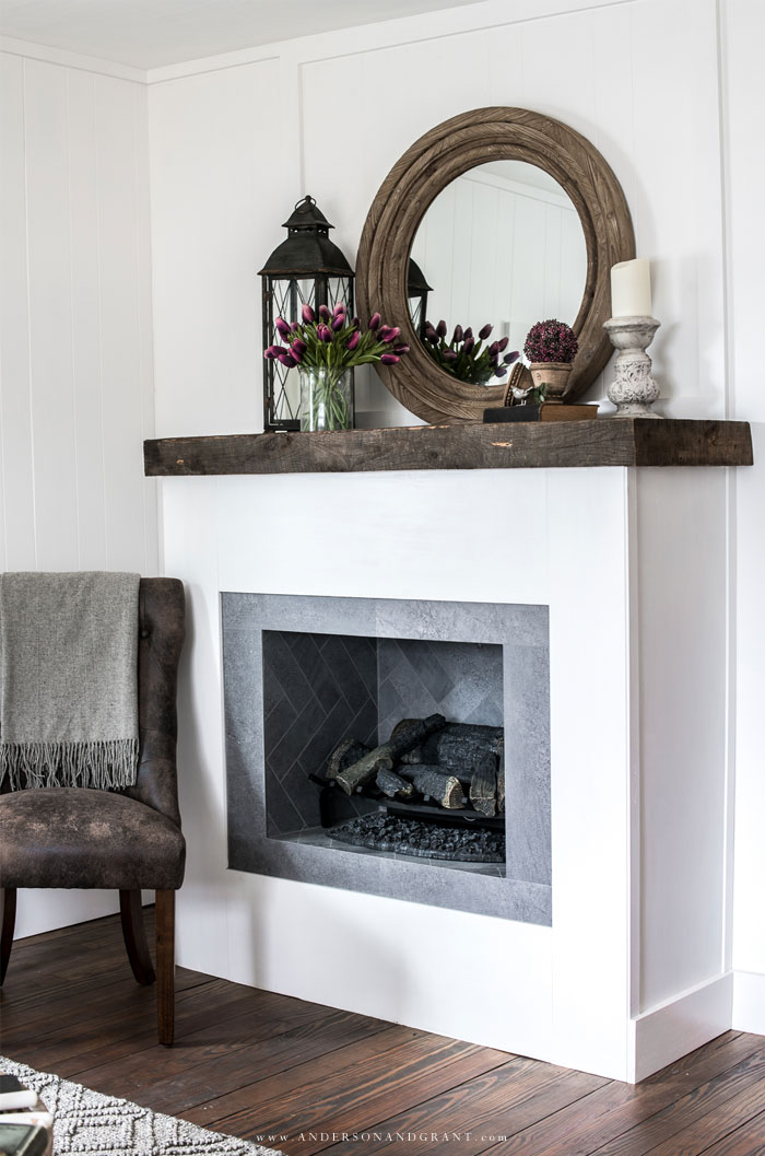 White fireplace decorated for spring