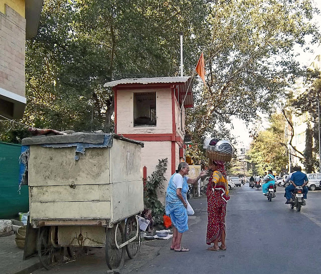 women selling utensils on road