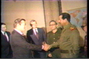 Donald Rumsfeld shaking Hands with Saddam Hussein