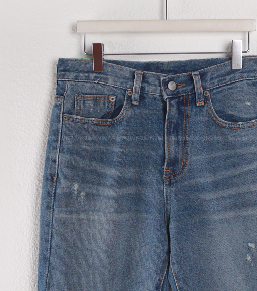 Whiskered and Distressed Accent Jeans