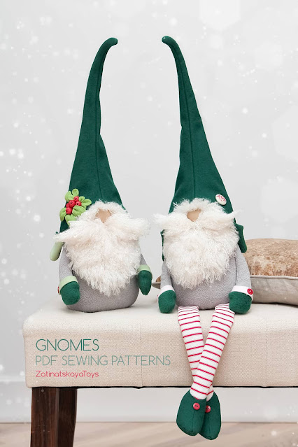 two large Christmas gnomes with hats on a padded stool by sewing patterns of Zatinatskaya Natalia