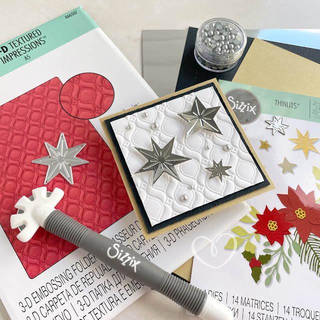 Square Christmas or New Year's card created with Sizzix Sufacez cardstock in black, gold, silver and white; Ornate Repeat embossing folder, festive foliage die; and Pinkfresh Studio Matte Silver Pearls.