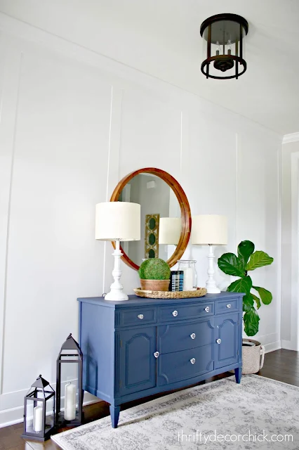 Simple board and batten look in white foyer