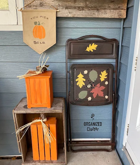 Photo of rustic fall decor on the covered patio.