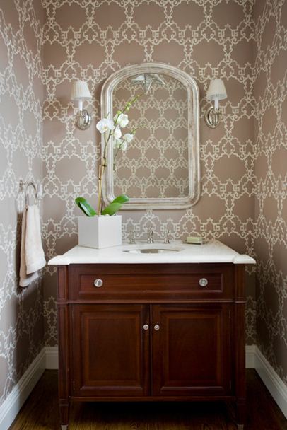 beige and white small half bathroom under stairs wood furniture vanity