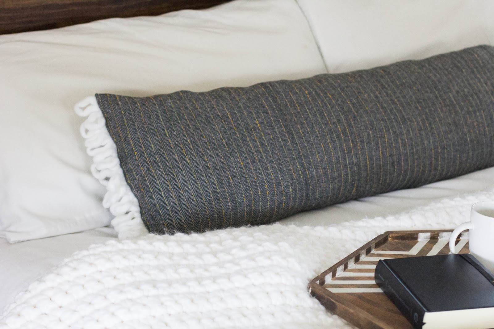 always rooney: Extra Long Lumbar Pillow | DIY - For less than 30 minutes, $8 in fabric and putting a use to old pillow  stuffing, I'd say this turned out all right! I've seen extra long pillows  going for ...