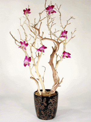 Just a few orchids on a Sandblasted Manzanita centerpiece can have a huge 