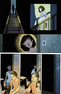 First panel is a dark silhouette of a woman on top of the stairs with a light going over the stairs. Next panel is her walking down the stairs, light shining in her face. Third panel is she looks into the room. Next bottom of panel she looks sad at the little girl with her arms up and her dad opening his arms to pick her up. Next panel the little girl is sitting on her dad's lap as he drinks a bottle of beer watching something on the computer screen. The woman, behind them goes to turn off the light as she walking past the room. Last panel both the father/daughter, computer screen, and the woman are gone. It's now dark.
