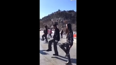 Chinese Grandpa and Chinese girl dancing