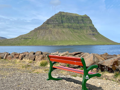 bench in front of Mt Kirkjufell in Grundarfjördur, Iceland