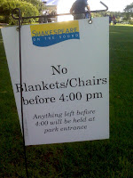 Sign: no blankets/chairs before 4:00 pm