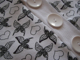 Perhosprinttiä paidassa