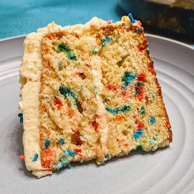 A slice of sprinkle-speckled cake