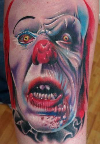 Killer Clown Tattoos but that also to see a clown in a sewer trying to get