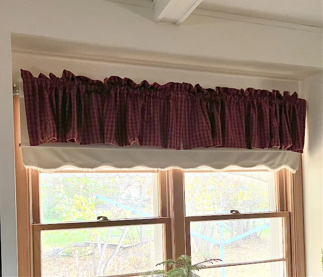 Photo of a homespun red valance.