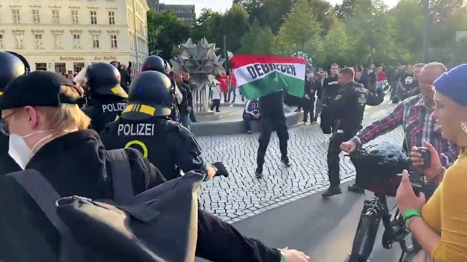 Összefutottak a magyar szurkolók a helyi antifa, klímarettegő csürhével (Videó)