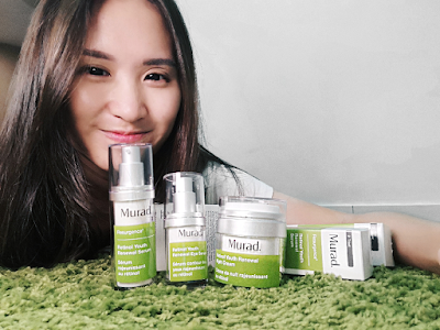 The Stepheny with her Dr Murad Youth Retinol Product Set on the grassy carpet