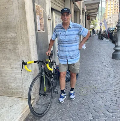 a man with a carbon road bike rental ready to enjoy cycling in Sorrento