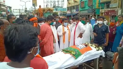 A BJP Worker Brutally killed   allegedly by TMC supporters while hosting the national flag