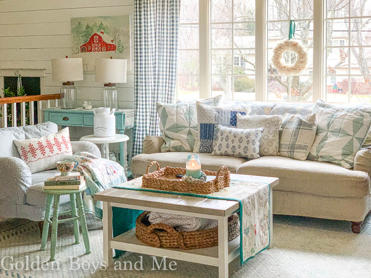 Cottage style living room with quilts and Ikea hack coffee table- www.goldenboysandme.com