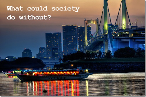 boat on a river with a city in the background