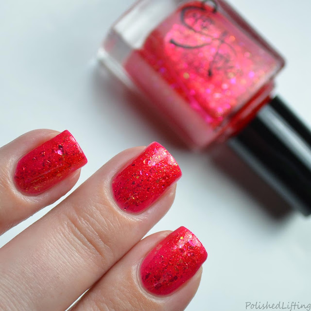 red jelly nail polish with shifting flakies